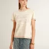 Camiseta crema para mujer con detalles en rojo descolorido