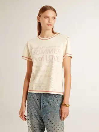 Camiseta crema para mujer con detalles en rojo descolorido