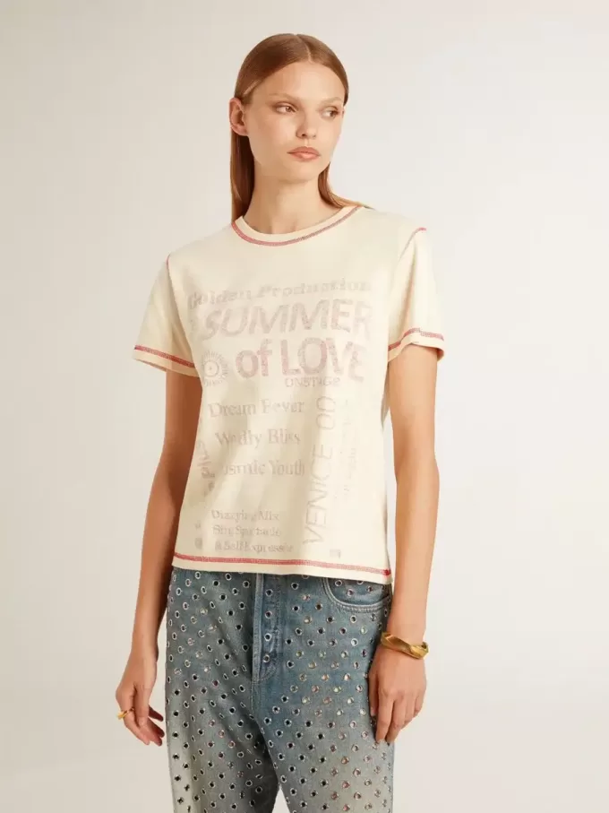 Camiseta crema para mujer con detalles en rojo descolorido