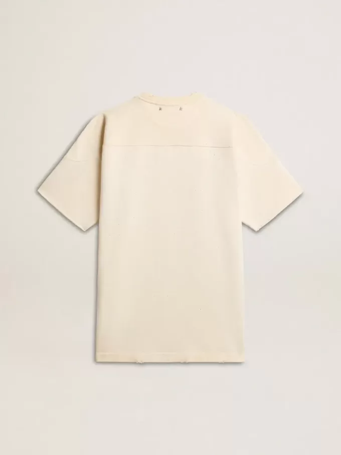 Camiseta de algodón para hombre en blanco vintage con borde sin rematar en la parte delantera. Camiseta de algodón para hombre en blanco vintage con borde sin rematar en la parte delantera.