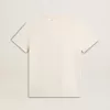 Camiseta de mujer en blanco envejecido con logotipo en el pecho Camiseta de mujer en blanco envejecido con logotipo en el pecho