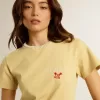 Camiseta de mujer en jersey de algodón con bordado en el cuello y el corazón Camiseta de mujer en jersey de algodón con bordado en el cuello y el corazón