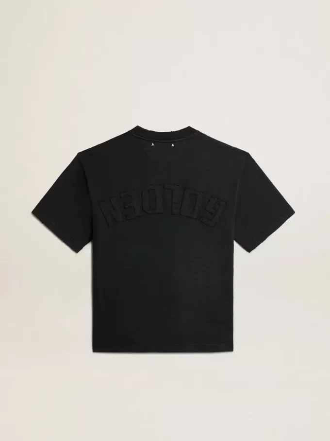 Camiseta en negro lavado con logotipo invertido en la espalda – Jersey Capsule Camiseta en negro lavado con logotipo invertido en la espalda – Jersey Capsule