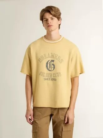 Camiseta oversize de algodón amarilla con estampado azul para hombre