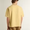 Camiseta oversize de algodón amarilla con estampado azul para hombre Camiseta oversize de algodón amarilla con estampado azul para hombre