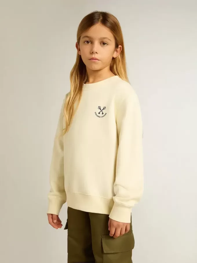 Camiseta para niña en blanco desgastado con bordado en la parte delantera y estampado en la espalda Camiseta para niña en blanco desgastado con bordado en la parte delantera y estampado en la espalda