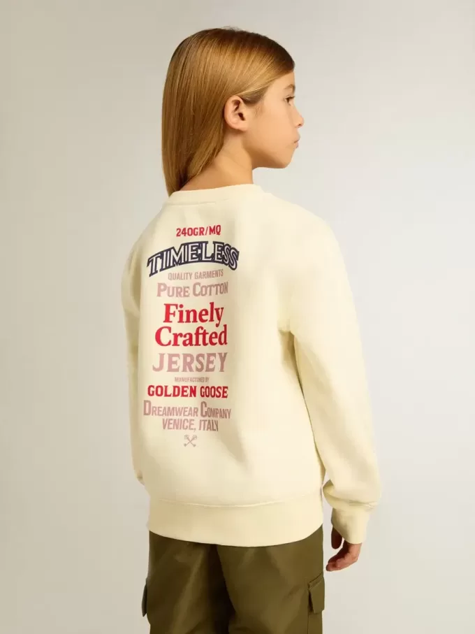 Camiseta para niña en blanco desgastado con bordado en la parte delantera y estampado en la espalda Camiseta para niña en blanco desgastado con bordado en la parte delantera y estampado en la espalda