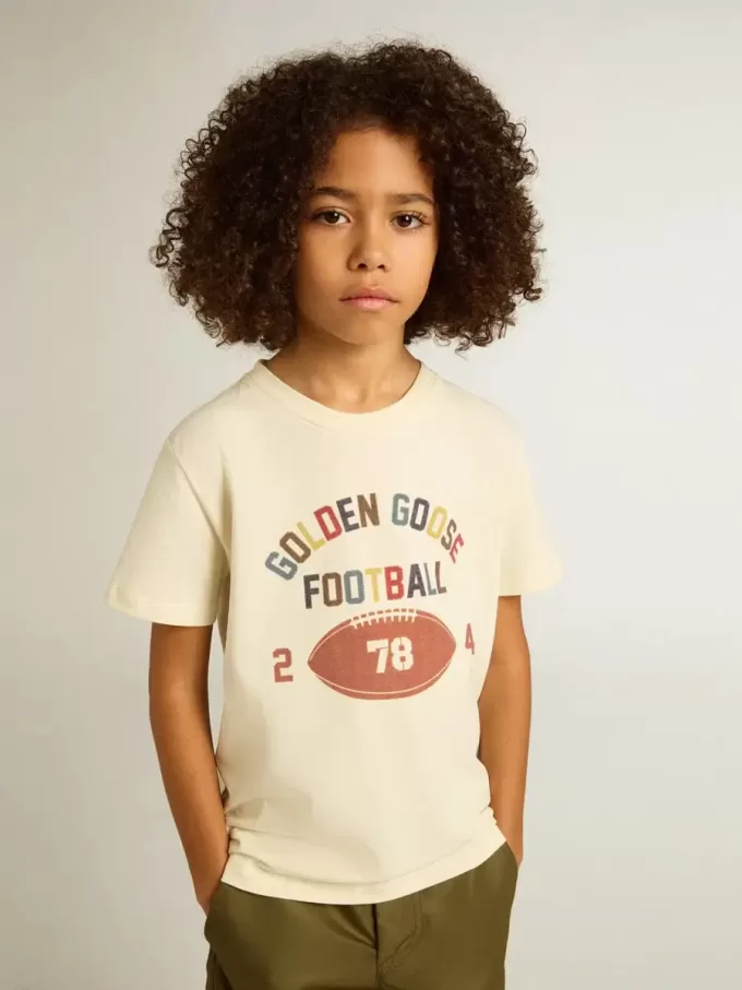 Camiseta para niño en blanco desgastado con letras multicolor Camiseta para niño en blanco desgastado con letras multicolor