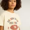 Camiseta para niño en blanco desgastado con letras multicolor Camiseta para niño en blanco desgastado con letras multicolor