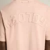 Camiseta rosa empolvado con logotipo invertido en la espalda – Jersey Capsule Camiseta rosa empolvado con logotipo invertido en la espalda – Jersey Capsule