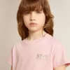 Camiseta rosa para niña con logotipo plateado brillante y estrella maxi Camiseta rosa para niña con logotipo plateado brillante y estrella maxi
