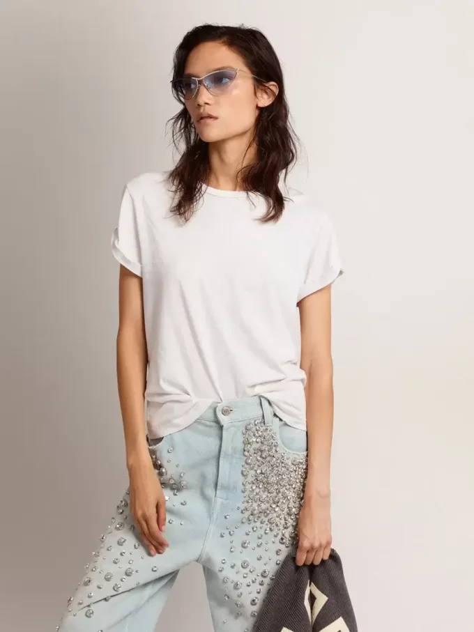 Camiseta slim fit para mujer en blanco con efecto desgastado Camiseta slim fit para mujer en blanco con efecto desgastado