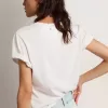 Camiseta slim fit para mujer en blanco con efecto desgastado Camiseta slim fit para mujer en blanco con efecto desgastado