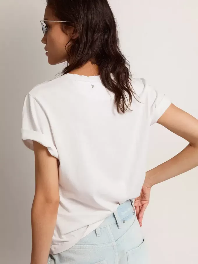 Camiseta slim fit para mujer en blanco con efecto desgastado Camiseta slim fit para mujer en blanco con efecto desgastado