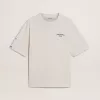 Camiseta unisex blanca con estampado mediterráneo y parche dorado Pescheria en la manga Camiseta unisex blanca con estampado mediterráneo y parche dorado Pescheria en la manga
