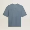 Camiseta unisex de algodón en azul celeste con estampado invertido en la espalda Camiseta unisex de algodón en azul celeste con estampado invertido en la espalda