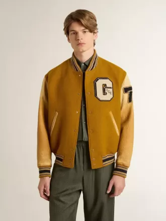 Cazadora bomber de lana amarillo ocre con mangas de cuero