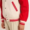 Cazadora bomber en blanco desgastado y rojo con bordados Cazadora bomber en blanco desgastado y rojo con bordados