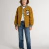 Cazadora bomber infantil de lana en color amarillo ocre con parche Cazadora bomber infantil de lana en color amarillo ocre con parche