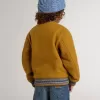 Cazadora bomber infantil de lana en color amarillo ocre con parche Cazadora bomber infantil de lana en color amarillo ocre con parche