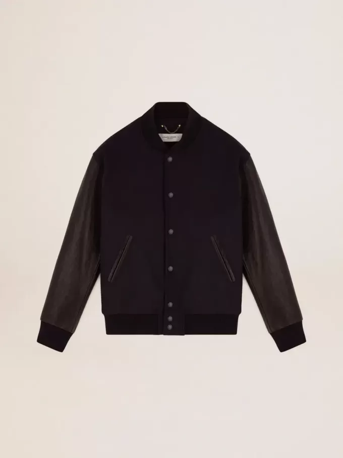 Cazadora bomber para hombre en lana azul oscuro con mangas de cuero Cazadora bomber para hombre en lana azul oscuro con mangas de cuero