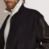 Cazadora bomber para hombre en lana azul oscuro con mangas de cuero Cazadora bomber para hombre en lana azul oscuro con mangas de cuero