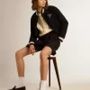 Cazadora bomber para mujer en lana azul oscuro con detalles en blanco Cazadora bomber para mujer en lana azul oscuro con detalles en blanco