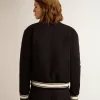 Cazadora bomber para mujer en lana azul oscuro con detalles en blanco Cazadora bomber para mujer en lana azul oscuro con detalles en blanco