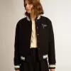 Cazadora bomber para mujer en lana azul oscuro con detalles en blanco Cazadora bomber para mujer en lana azul oscuro con detalles en blanco