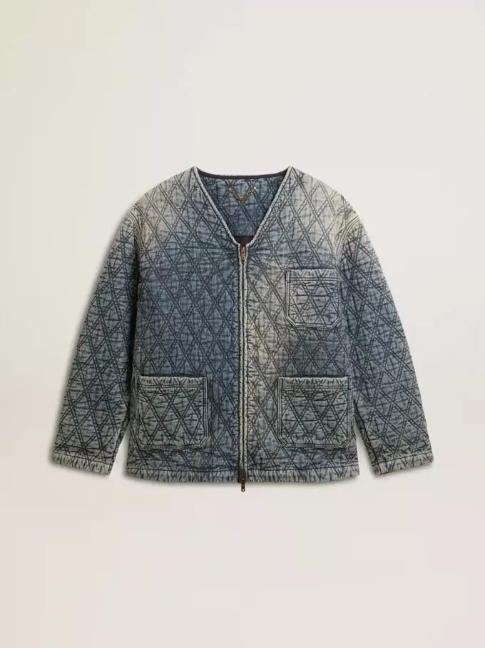Chaqueta acolchada azul para mujer en denim de algodón con acabado desgastado Chaqueta acolchada azul para mujer en denim de algodón con acabado desgastado