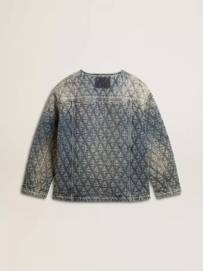 Chaqueta acolchada azul para mujer en denim de algodón con acabado desgastado Chaqueta acolchada azul para mujer en denim de algodón con acabado desgastado