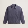 Chaqueta azul para hombre en algodón denim con tratamiento desgastado Chaqueta azul para hombre en algodón denim con tratamiento desgastado