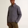 Chaqueta azul para hombre en algodón denim con tratamiento desgastado Chaqueta azul para hombre en algodón denim con tratamiento desgastado
