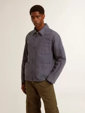 Chaqueta azul para hombre en algodón denim con tratamiento desgastado