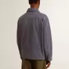 Chaqueta azul para hombre en algodón denim con tratamiento desgastado Chaqueta azul para hombre en algodón denim con tratamiento desgastado