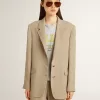 Chaqueta beige de rayas finas para mujer, de corte oversize y botonadura sencilla Chaqueta beige de rayas finas para mujer, de corte oversize y botonadura sencilla