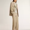 Chaqueta beige de rayas finas para mujer, de corte oversize y botonadura sencilla Chaqueta beige de rayas finas para mujer, de corte oversize y botonadura sencilla