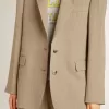 Chaqueta beige de rayas finas para mujer, de corte oversize y botonadura sencilla Chaqueta beige de rayas finas para mujer, de corte oversize y botonadura sencilla