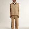 Chaqueta beige para hombre con bordado floral y cremallera completa