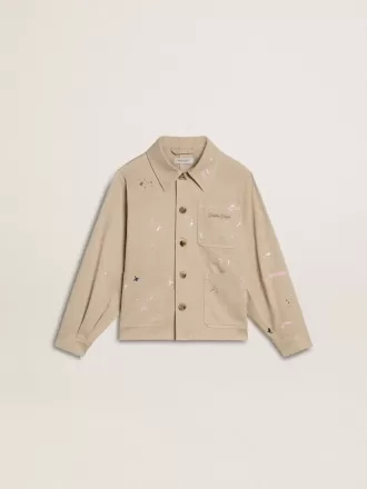 Chaqueta beige para niño con salpicaduras multicolores