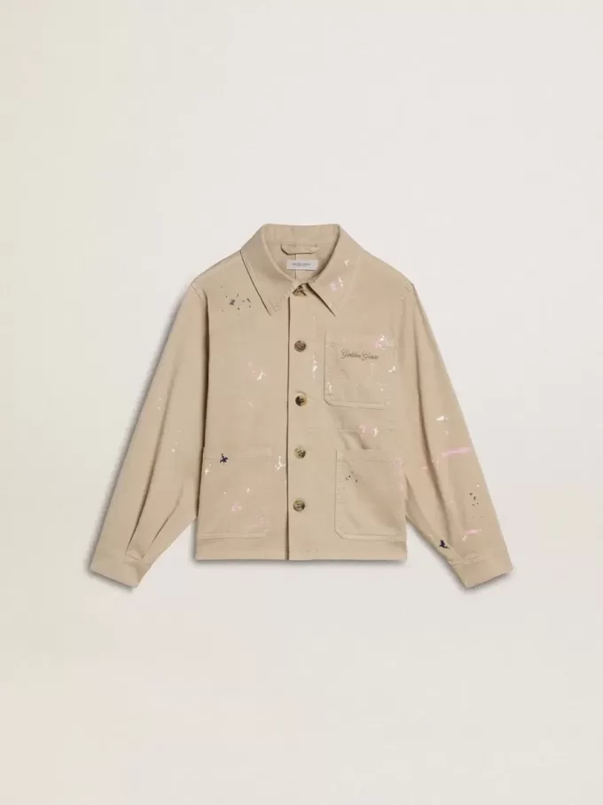 Chaqueta beige para niño con salpicaduras multicolores