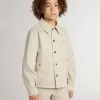Chaqueta beige para niño con salpicaduras multicolores