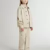 Chaqueta beige para niño con salpicaduras multicolores