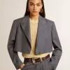 Chaqueta corta de mujer de lana azul claro con botonadura sencilla Chaqueta corta de mujer de lana azul claro con botonadura sencilla