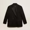 Chaqueta de esmoquin para mujer en gabardina de lana negra. Chaqueta de esmoquin para mujer en gabardina de lana negra.