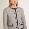 Chaqueta de lana y seda gris para mujer con ribete de ante negro Chaqueta de lana y seda gris para mujer con ribete de ante negro