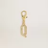 Charm con la letra Q en latón dorado con cristales Charm con la letra Q en latón dorado con cristales
