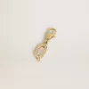 Charm con la letra Q en latón dorado con cristales Charm con la letra Q en latón dorado con cristales