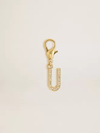 Charm con la letra U en latón dorado con cristales
