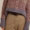 Cinturón negro para mujer en piel lavada con tachuelas doradas Cinturón negro para mujer en piel lavada con tachuelas doradas